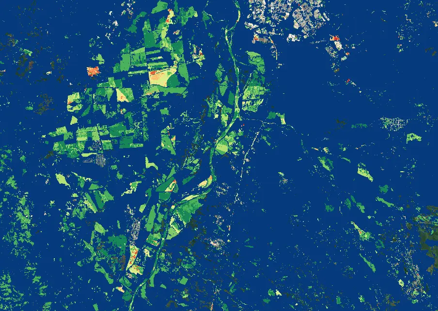 Mapa de duración de la temporada de vegetación: parcelas agrícolas en rojo, amarillo y verde sobre un fondo azul oscuro de vegetación activa todo el año, atravesado por un río.